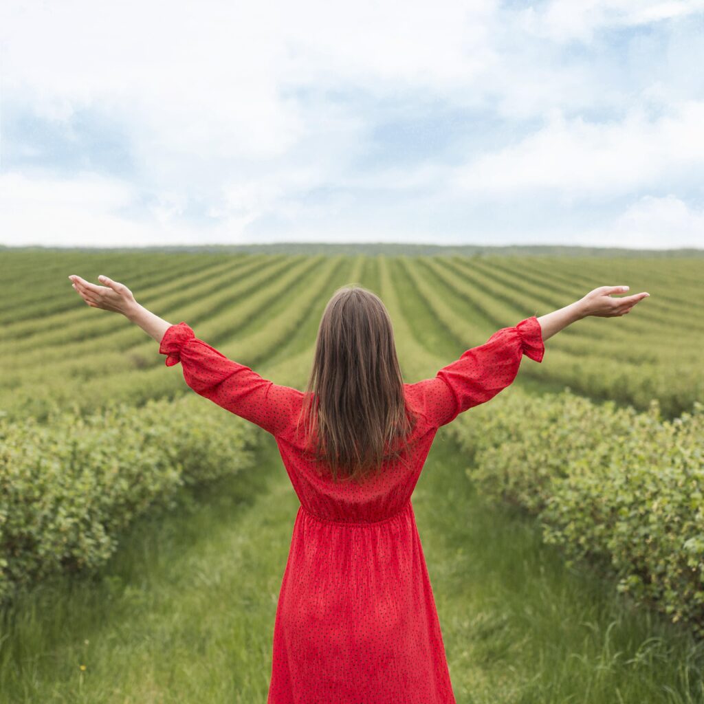 happy-woman-in-field