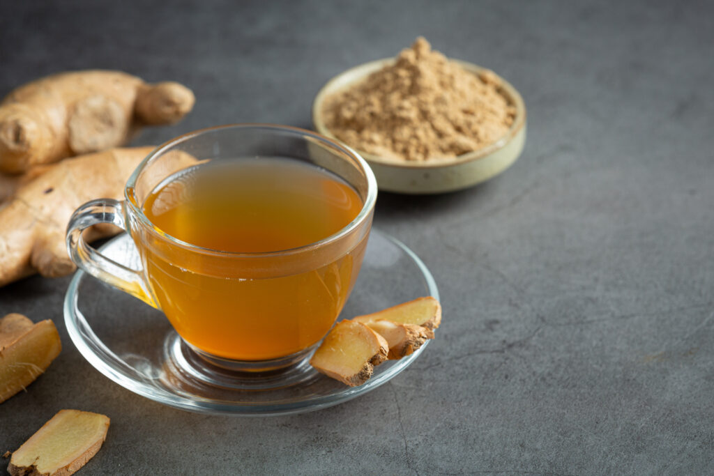 hot ginger tea on table-Morning Sickness, herbal tea for Pregnancy